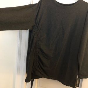 Dark gray long sleeve shirt with side drawstring